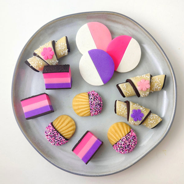 mother's day cookies on a grey plate