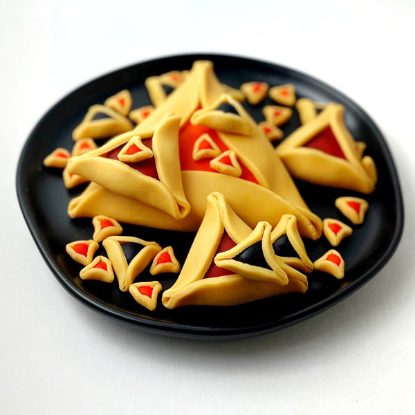 sierpinski hamantaschen purim on a plate