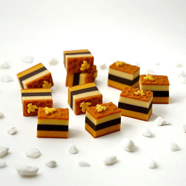 rosh hashanah golden bee honeycomb cookies flat lay