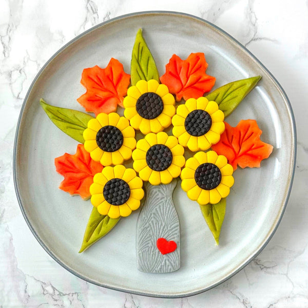 autumn flower bouquet on a grey plate
