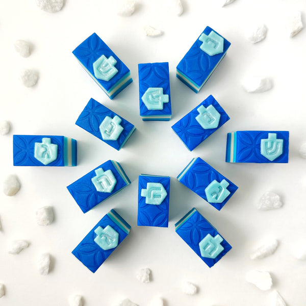 hanukkah striped dreidel cookies top view