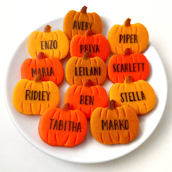 personalized pumpkins on a plate