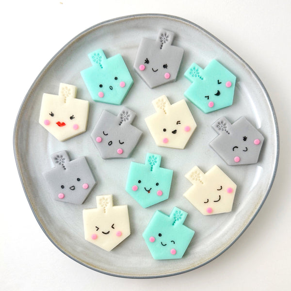 happy dreidels hannukah candy on a plate