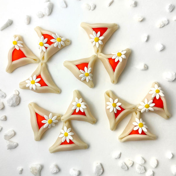 purim daisy hamantaschen flatlay