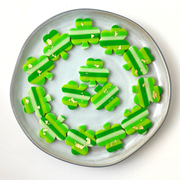 st patricks shamrock cookies on  a plate