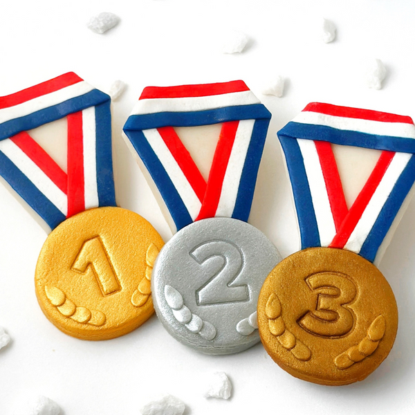 olympics party medals gold silver bronze closeup