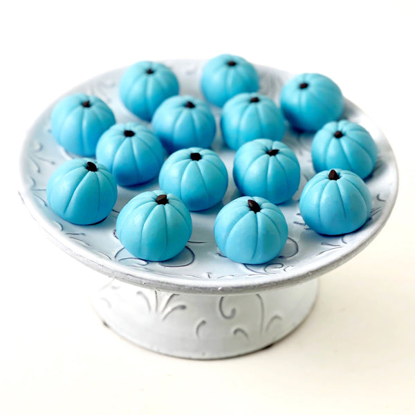 custom pumpkins on a riser