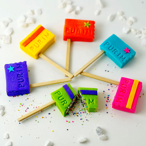 purim grogger sprinkle surprise flatlay