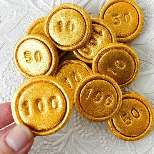 Hanukkah gold gelt marzipan tiles close up