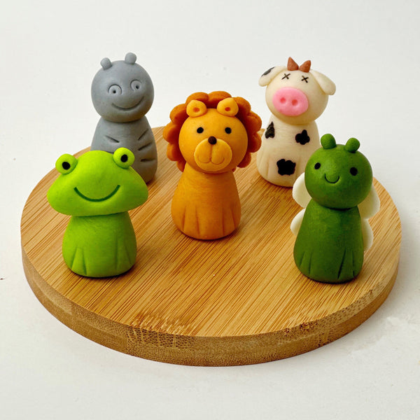 passover marzipan animals plagues on a board