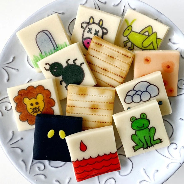 passover seder ten plagues and matzah marzipan tiles on a plate