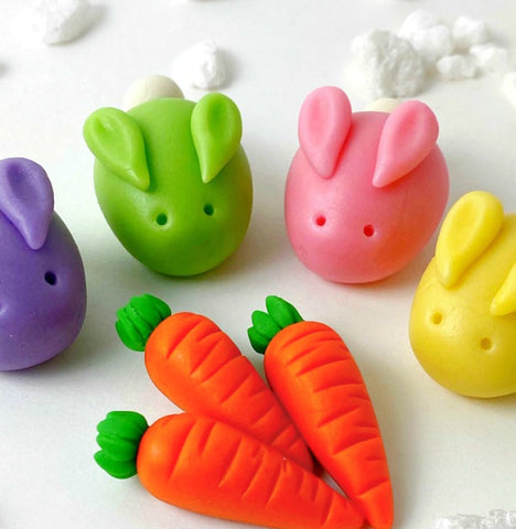 pastel easter bunnies marzipan candy sculpture treat close up