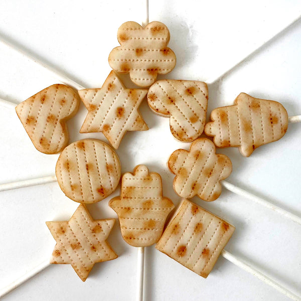 Passover Seder matzah variety marzipan candy lollipops in a circle