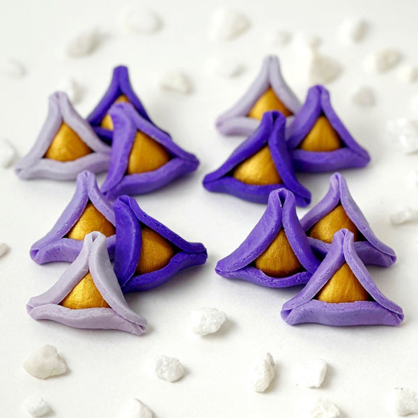 purple ombré marzipan hamamtaschen  in piles
