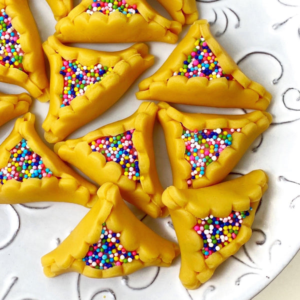 Purim vegan gluten-free purim sprinkle hamantaschen marzipan candy sculpture treats closeup