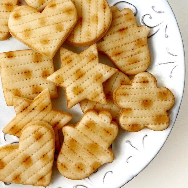 passover matzah marzipan assorted shape tiles closeup