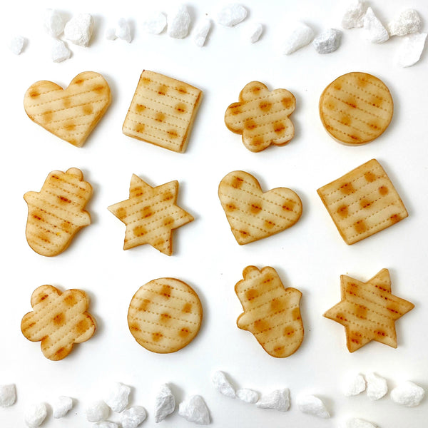 passover matzah marzipan assorted shape tiles closeup