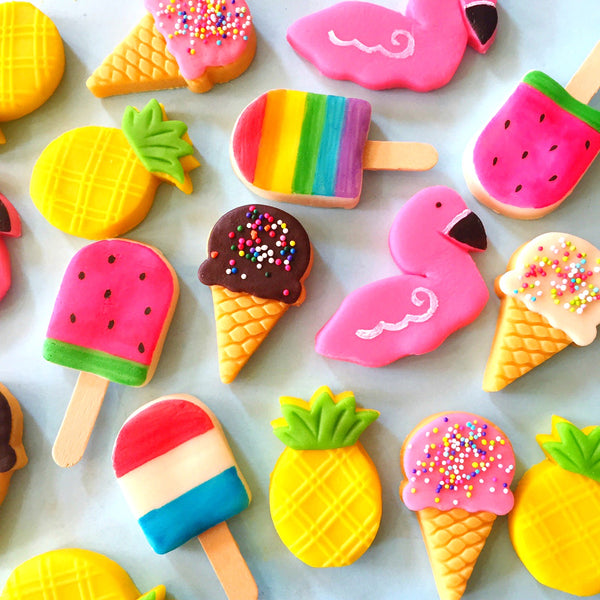 summer tropical marzipan candy treats with flamingos, pineapples, ice cream cones and popsicles