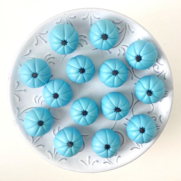 custom pumpkins on a plate