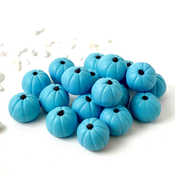 custom pumpkins  in a pile