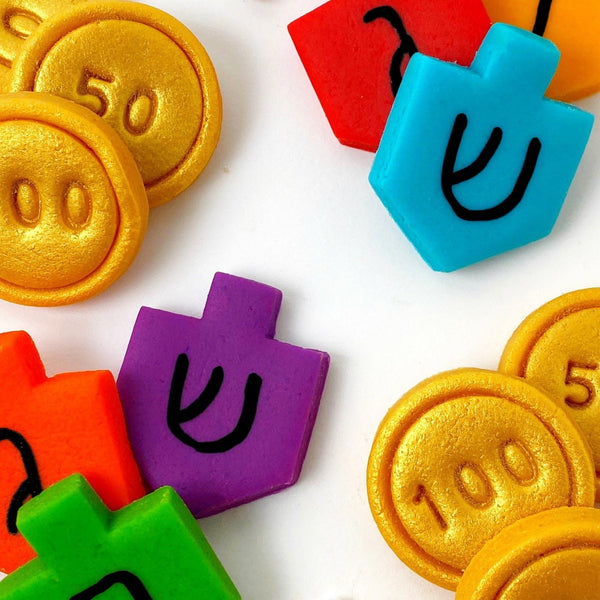 Hanukkah dreidel and gold gelt marzipan candy tiles dozen closeup
