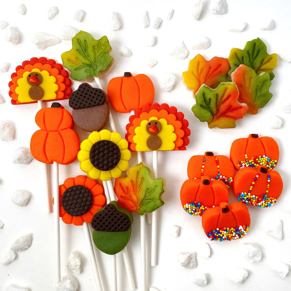 Thanksgiving ultimate collection with pumpkins, turkeys, sunflowers, maple leaves and acorns marzipan candy lollipops sprinkles