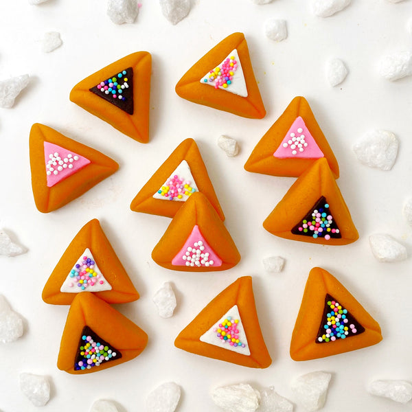 purim hamantaschen donuts laid out