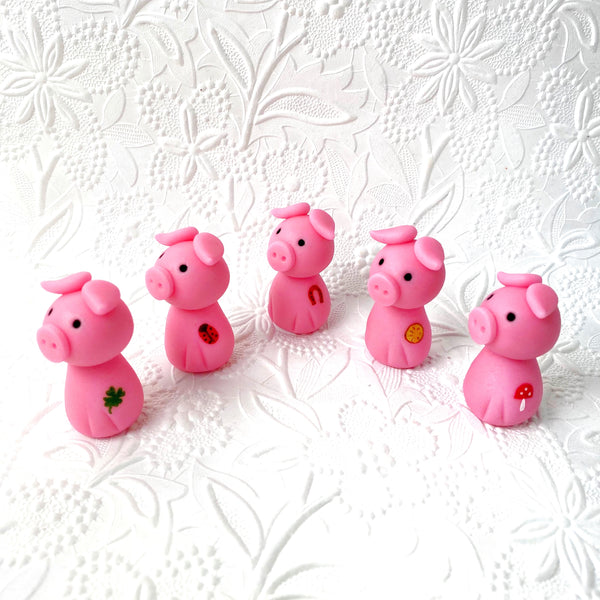 marzipan pigs glucksschwein candy in a row
