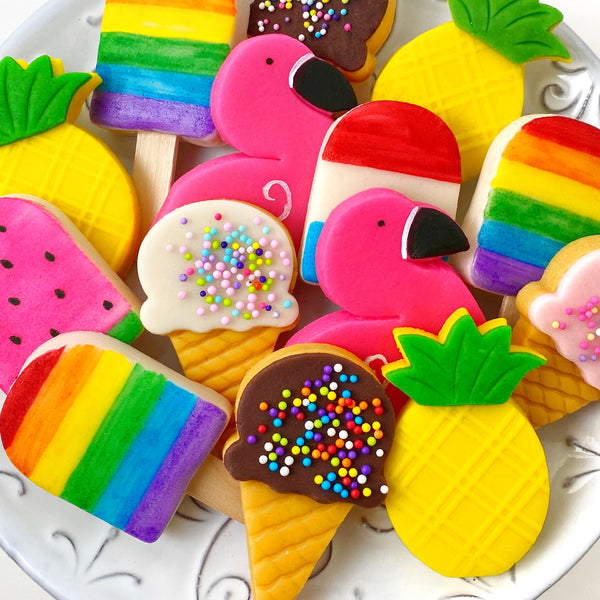 A delcious collection of tropical marzipan candy for summer.  Favors for birthdays, pool parties, hawaiian parties, luau parties and summer celebration. Pineapples, flamingos, ice cream cones and popsicles. Cool vegan treats and yummy gift idea! - up close
