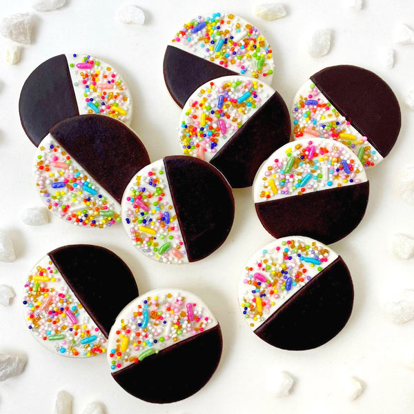 sprinkle black white marzipan candy cookies laid out