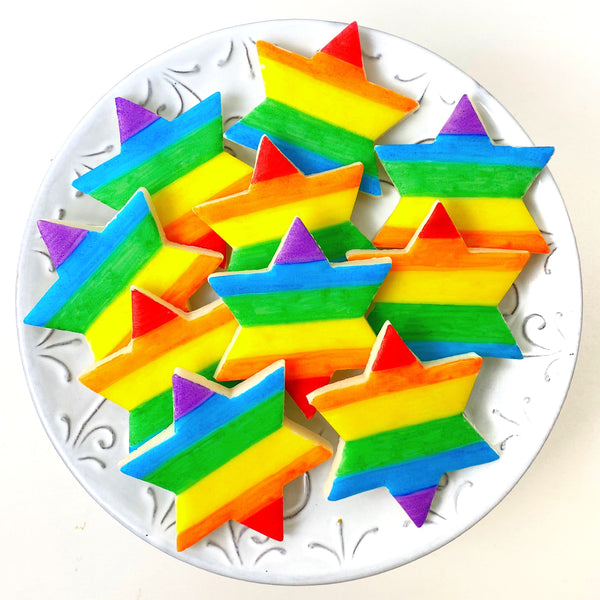 rainbow pride star of David marzipan candy tiles on a plate