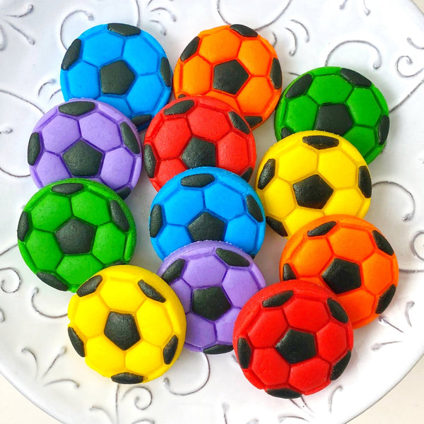 rainbow soccer balls marzipan candy on a plate
