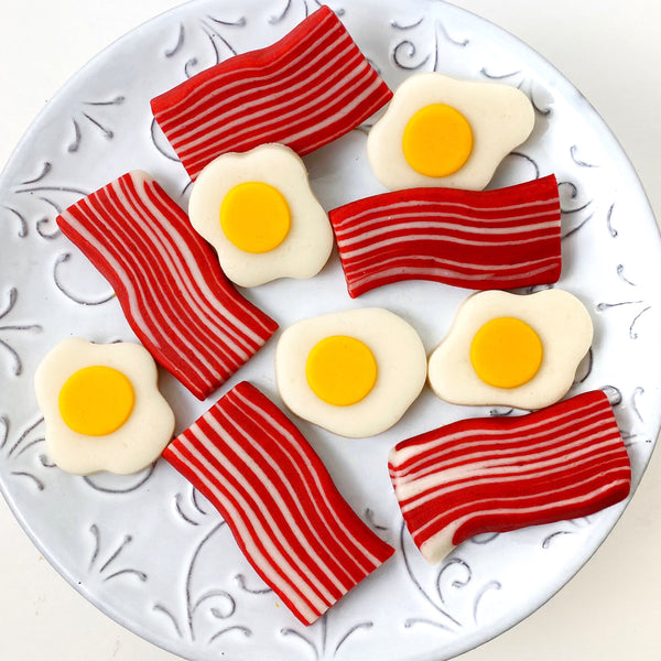 eggs bacon marzipan candy tiles on a plate