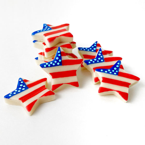 july 4th star marzipan candy tiles in a pile