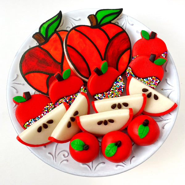 all apple rosh hashanah marzipan candy collection on a plate