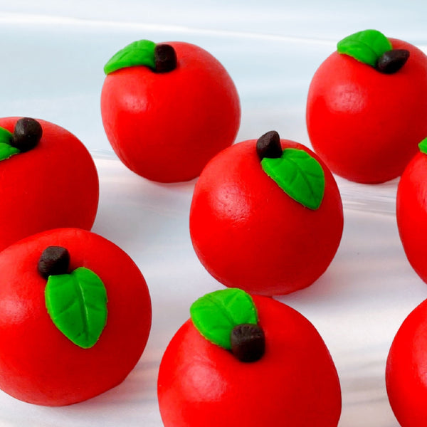 rosh hashanah delicious red apple marzipan sculptures closeup