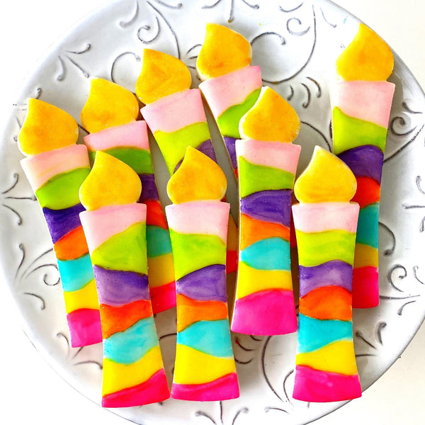 fantasy rainbow hanukkah menorah candles  on a plate