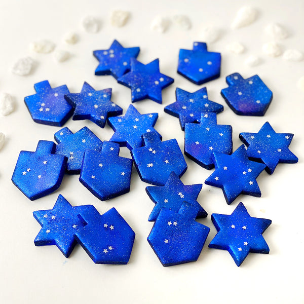 galaxy dreidels star of David hanukkah sparkly tiles laid out