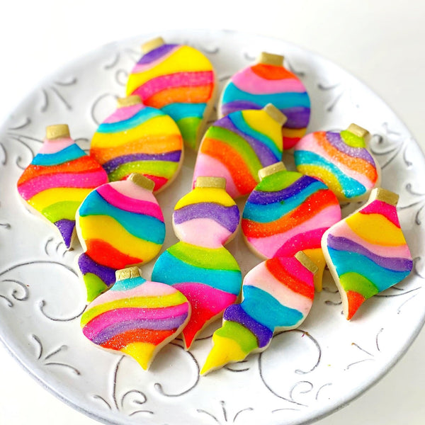 fantasy christmas rainbow ornaments marzipan candy on a plate