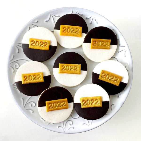 new year's cookie black & white on a plate