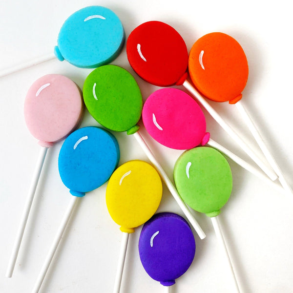 birthday marzipan balloon lollipops condensed flatlay