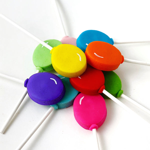 birthday marzipan balloon lollipops in a pile