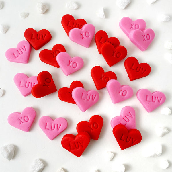 Valentine's Day pink & red hearts mini marzipan candy bites flatlay