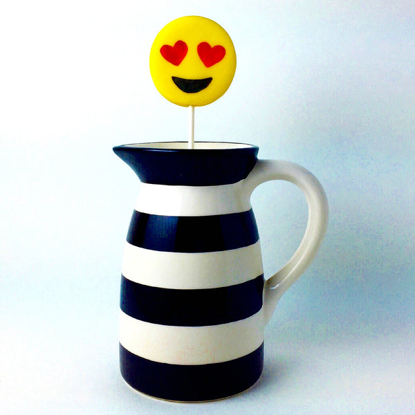 heart eyes yellow emoji marzipan candy lollipop in a vase