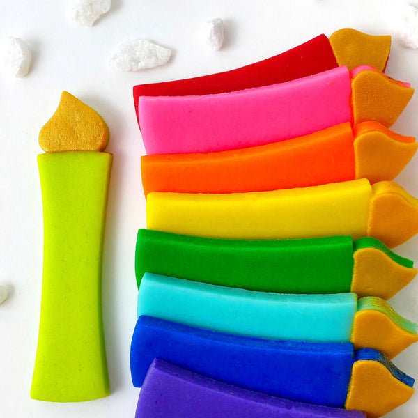 hanukkah rainbow menorah candles marzipan candy closeup