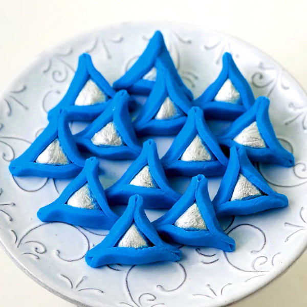 celebrate israel hamantaschen on a plate