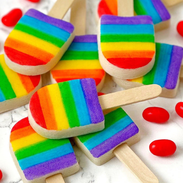 rainbow ice popsicles marzipan candy lollipops with real sticks cropped pile
