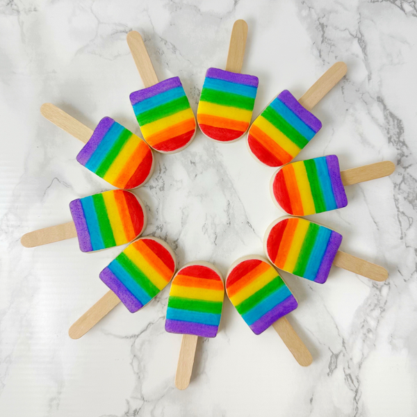 rainbow ice popsicles marzipan candy lollipops with real sticks in a circle