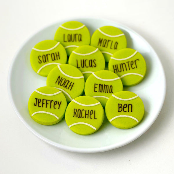 personalized tennis ball candy tiles on a small plate