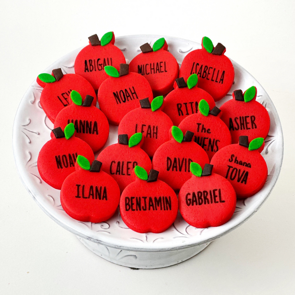 personalized rosh hashanah marzipan apples on a plate